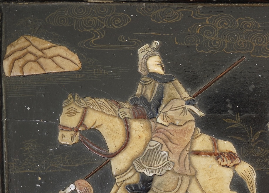 A Chinese lacquer, soapstone, mother-of-pearl and bone overlaid panel, 18th/19th century